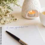 Notebook with "I am grateful for" in handwritten text